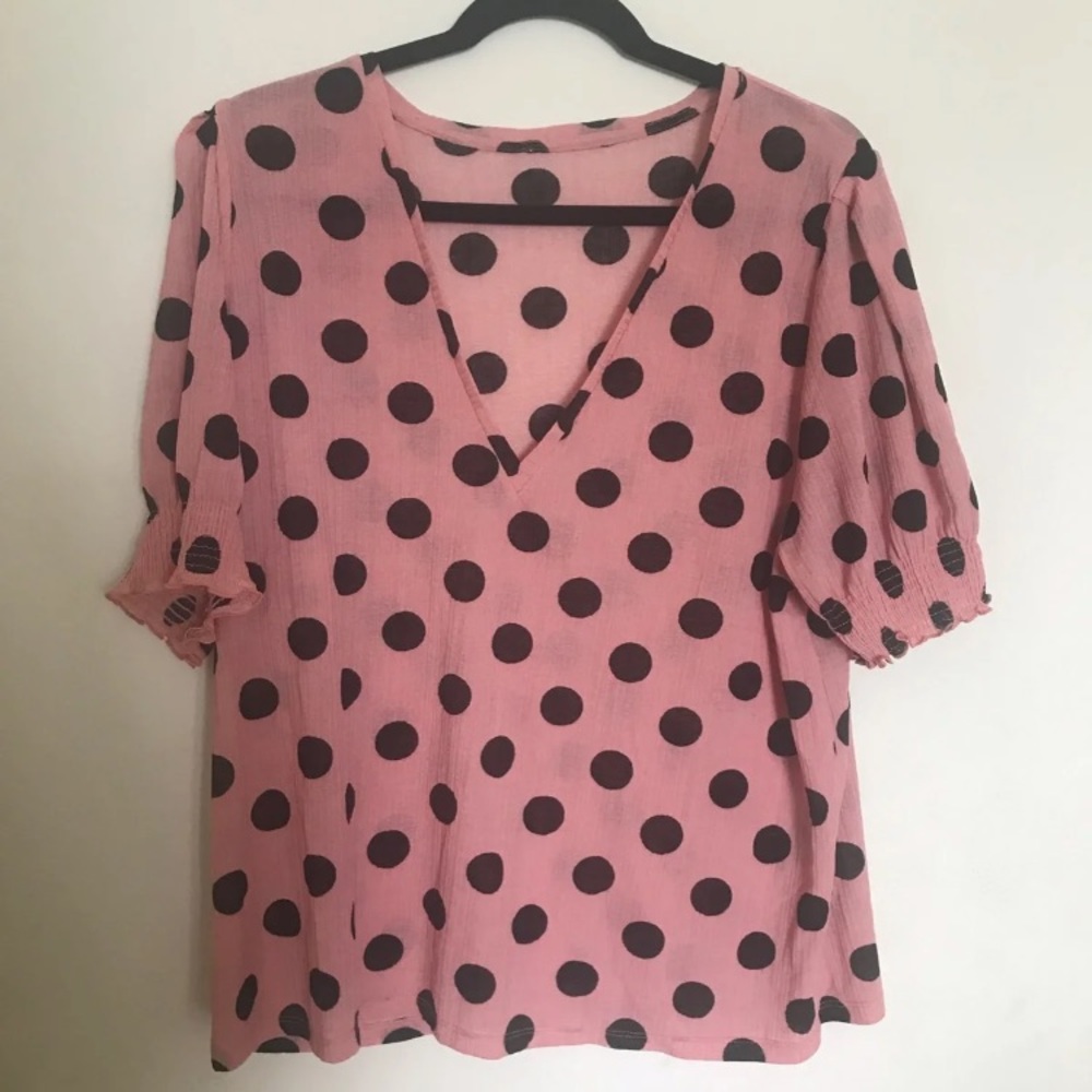 pink and black polka dot women’s blouse